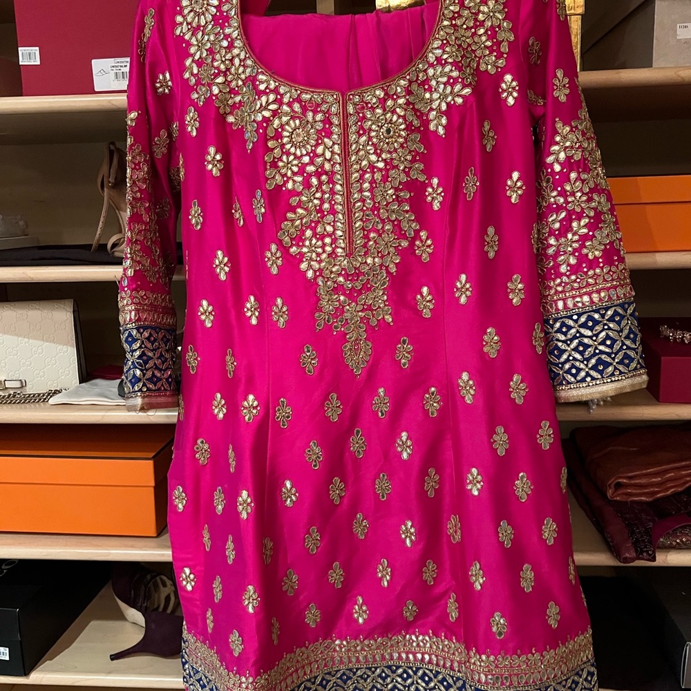 Stunning hot pink, blue, and gold shalwar kameez. Mirror work